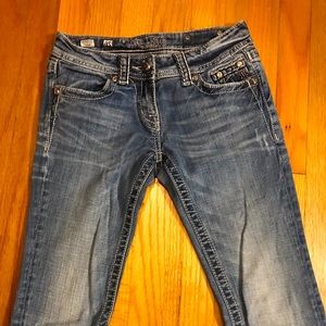 Miss Me jeans size 26 bootcut . Distressed and embellished back pockets